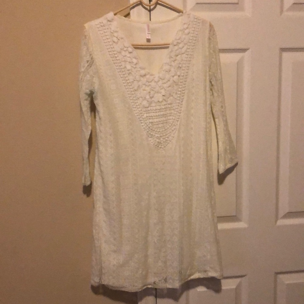 Lacy white dress with beautiful accents